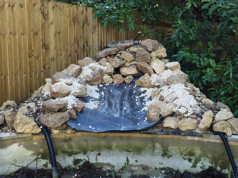 Communal pond waterfall repair and aquatic vegetation installation Camberley, Surrey