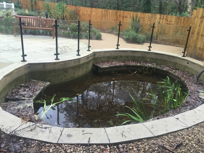 Communal pond waterfall repair and aquatic vegetation installation Camberley, Surrey