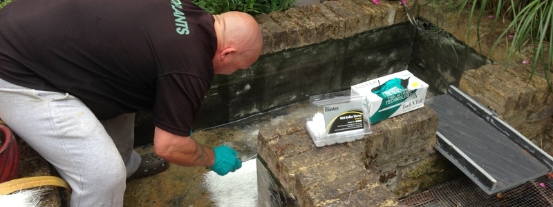 Pond clean and re sealing using GRP in Chiswick, London Pond clean and re sealing using GRP in Chiswick, London