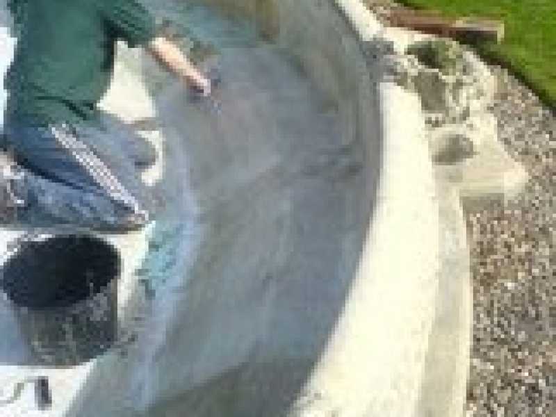 Fountain basin fibreglassing in Theydon Bois, Essex.