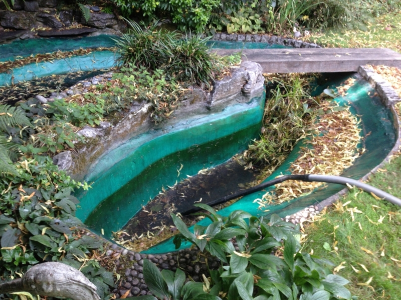 Pond cleaning and resealing in Hampstead Heath, London.