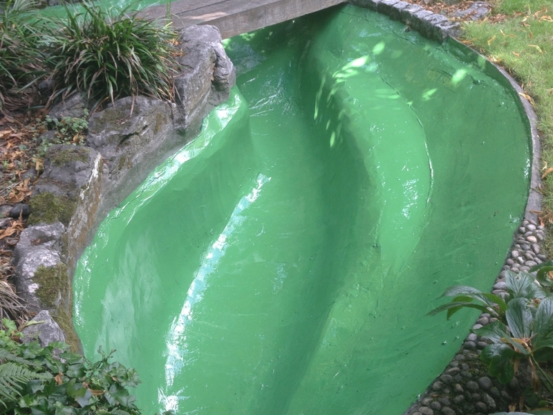 Pond cleaning and resealing in Hampstead Heath, London.