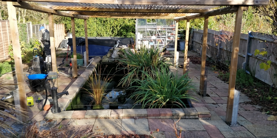Arnos Grove, London pond cleaning