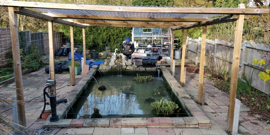 Arnos Grove, London pond cleaning